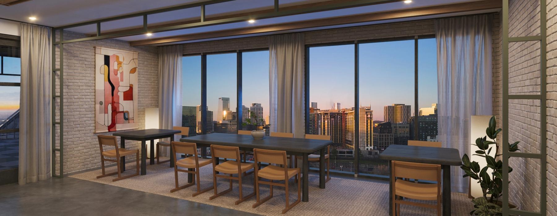 a room with tables and chairs and windows with a view of the city