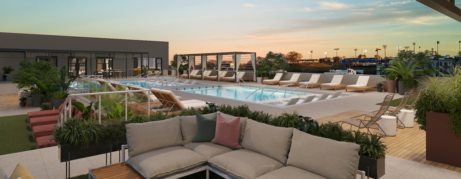 Rooftop pool are with outdoor couches 
