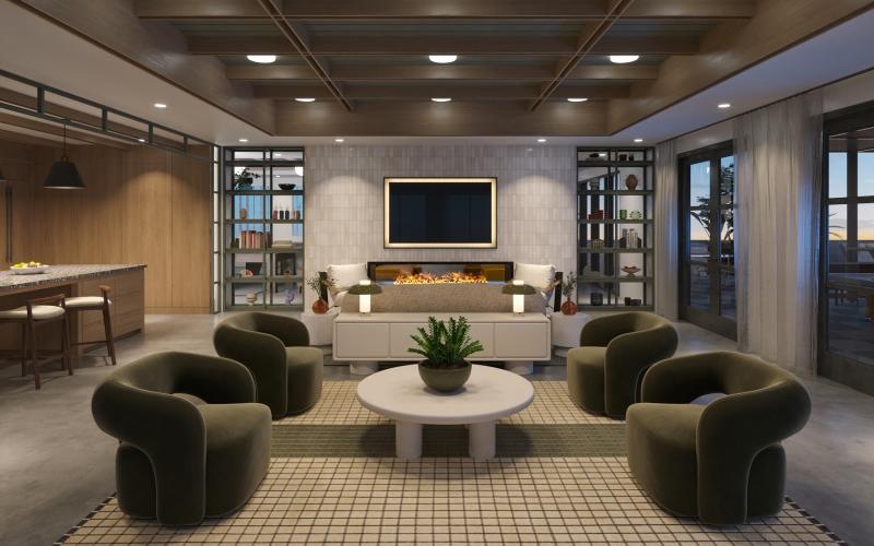 a community lounge with a tv and chairs