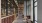 a long mailroom with chairs and tables