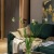 a community lounge room with a couch and a coffee table